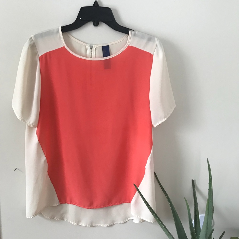 Cream and sorbet orange blouse from Francesca’s